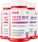 Three bottles of Supra Keto supplement displayed side by side with clear labeling and dosage instructions.